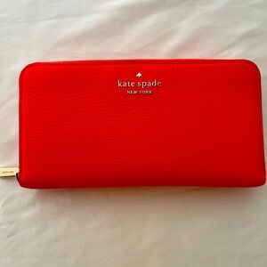 Kate Spade wallet. Hot summer color. Practicality Brand new!!!